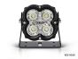 Front view of the lamp face showing the lens and central light source, with the housing and bezel clearly visible.